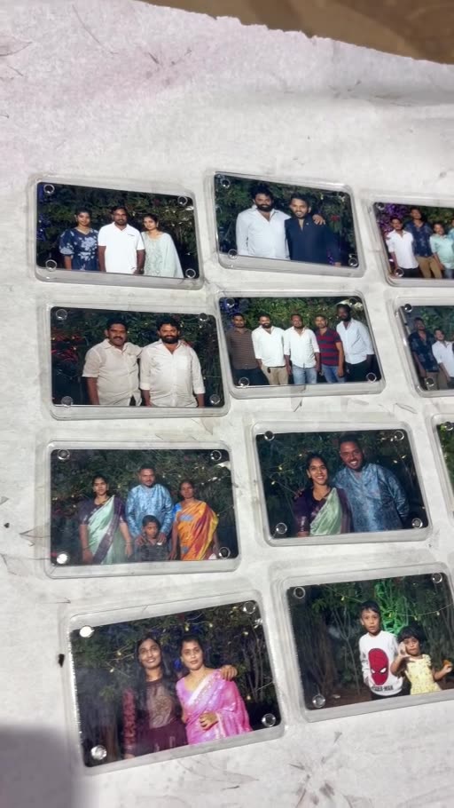 Printed guest photos displayed in clear acrylic photo magnets